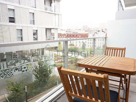 Very quiet and very bright balcony with woodenfloor