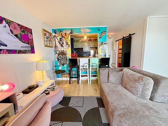 Very quiet living room furnished with 1 bed(s) of 140cm, tv, storage space, cupboard