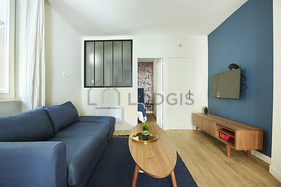 Very quiet living room furnished with 1 sofabed(s) of 140cm, tv, cupboard, 1 chair(s)