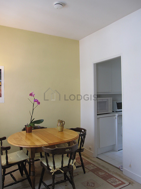 Living room with double-glazed windows facing the road