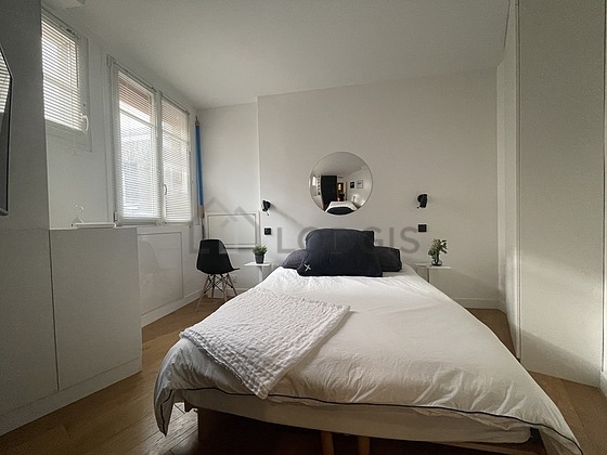 Chambre de 11m² avec du parquet au sol