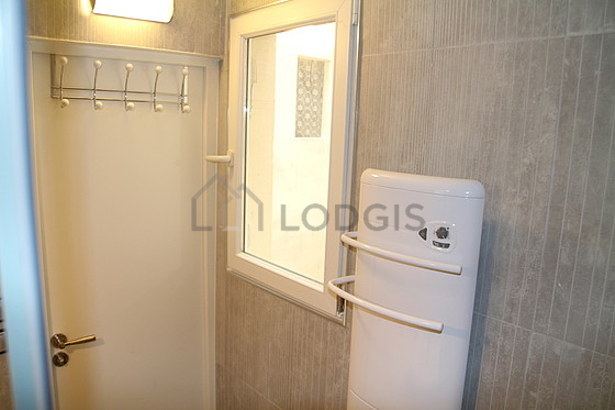 Pleasant and bright bathroom with tile floor