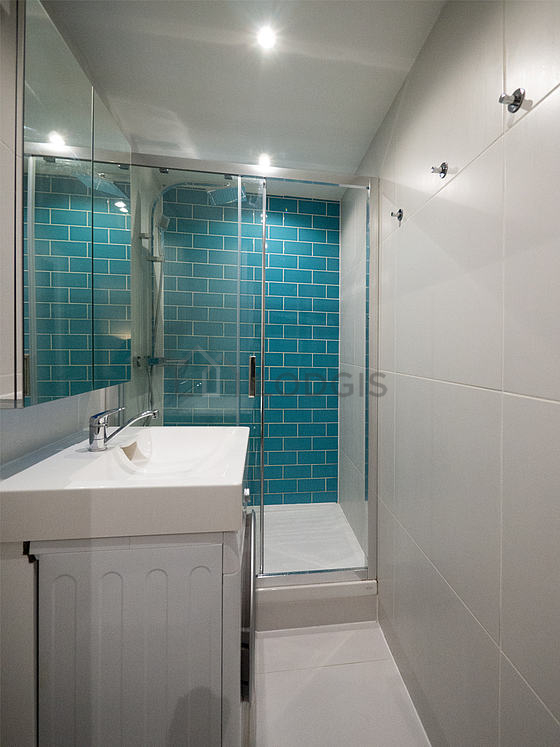 Bathroom equipped with washing machine, dryer, cupboard