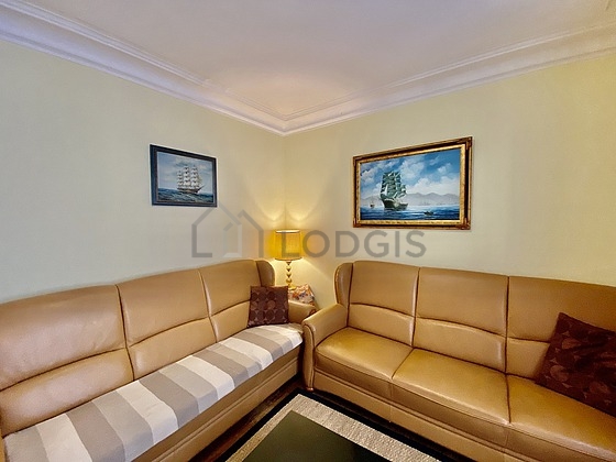 Living room with windows facing the road