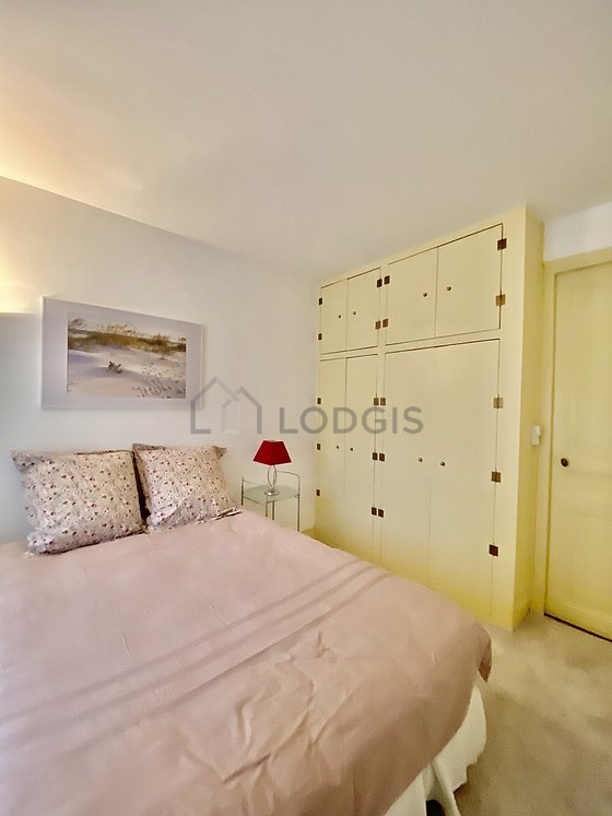Very bright bedroom equipped with desk, wardrobe, cupboard, 1 chair(s)