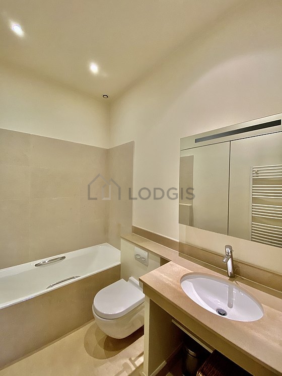 Pleasant and bright bathroom with tile floor