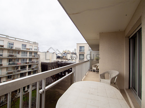 Balcony equipped with 2 armchair(s)