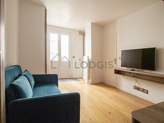 Séjour d'un appartement à Paris