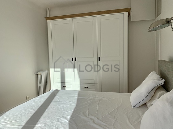 Bedroom with double-glazed windows facing the road