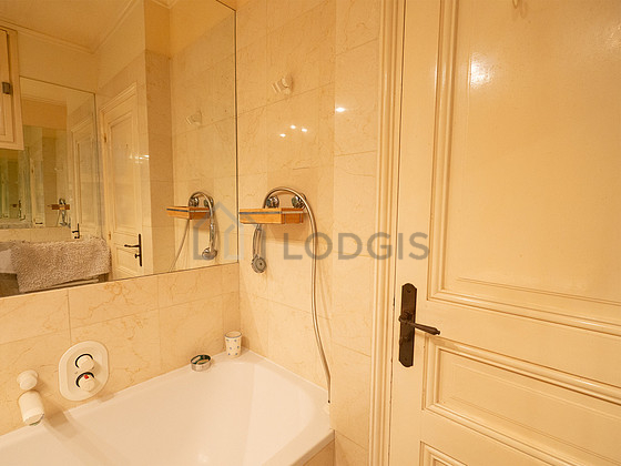 Bathroom equipped with cupboard
