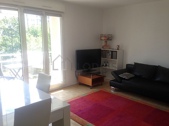 Living room furnished with tv, 1 chair(s)
