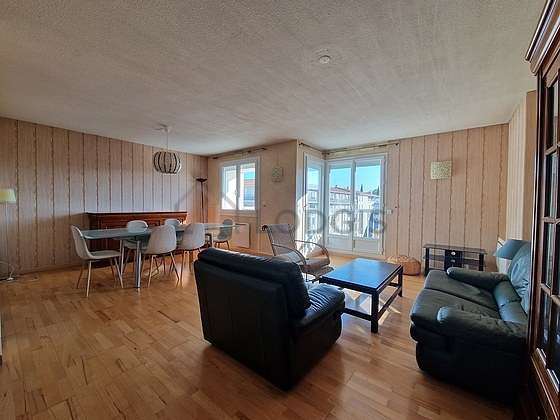 Living room furnished with tv, storage space, 7 chair(s)