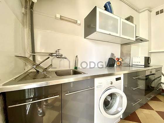 Kitchen equipped with washing machine