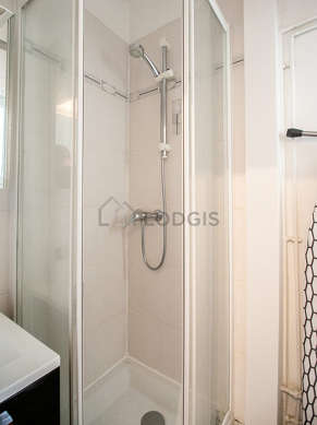 Bathroom equipped with separate shower, towel drying radiator