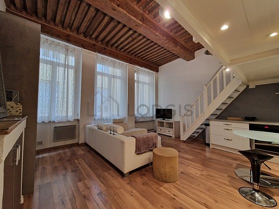 Living room furnished with tv, cupboard, 1 chair(s)