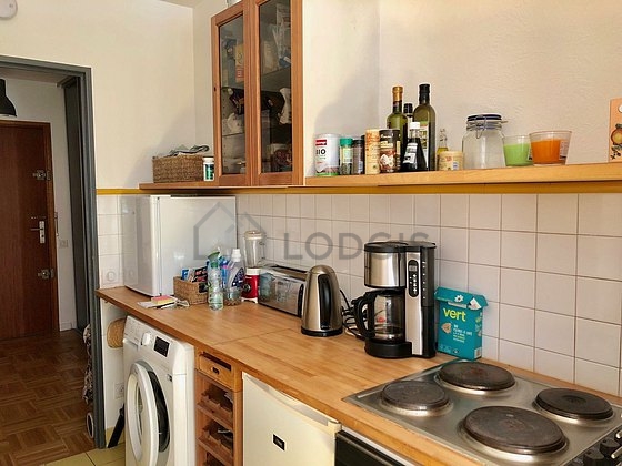 Kitchen where you can have dinner for 2 person(s) equipped with washing machine, refrigerator, crockery