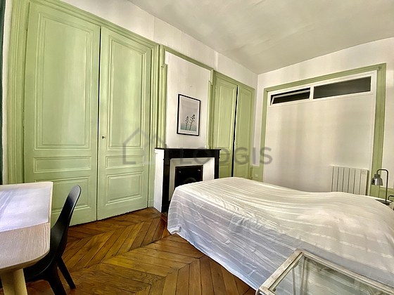 Bedroom with wooden floor