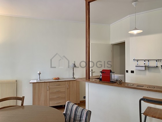 Kitchen where you can have dinner for 2 person(s) equipped with washing machine, dryer, refrigerator, crockery