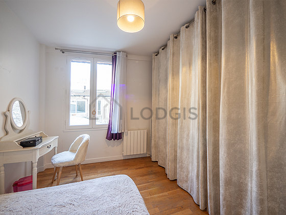 Bright bedroom equipped with wardrobe, cupboard, 1 chair(s)