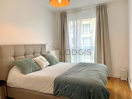 Chambre de 12m² avec du parquet au sol