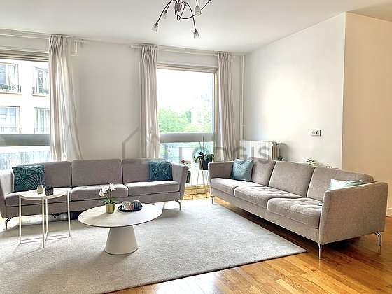 Very quiet living room furnished with home cinema, tv, 1 armchair(s), 4 chair(s)