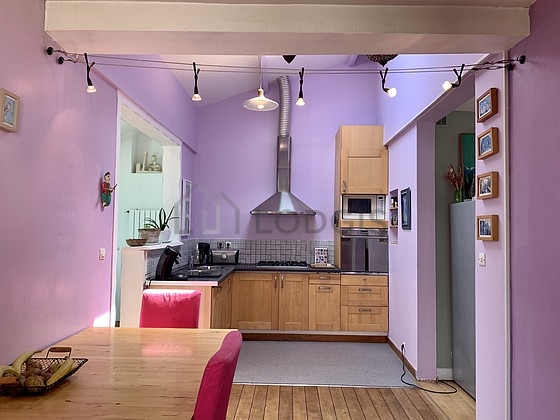 Kitchen equipped with washing machine, refrigerator, freezer, crockery