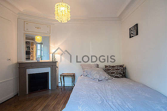 Bedroom with wooden floor