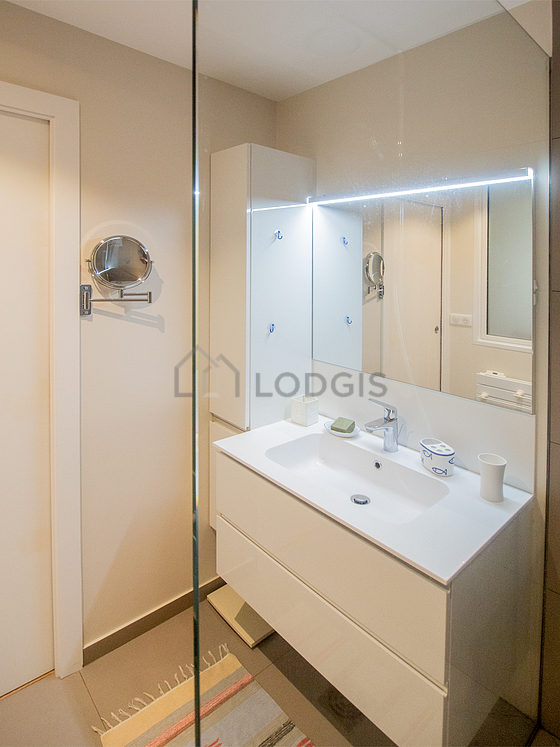 Bathroom equipped with shelves