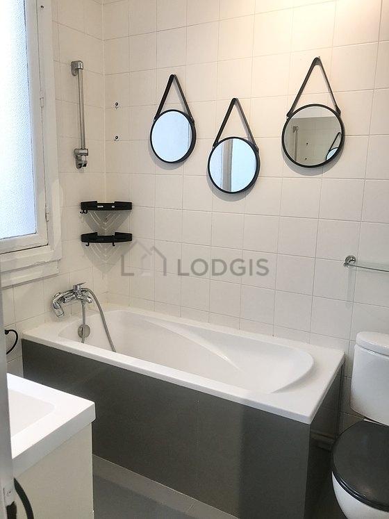 Beautiful and very bright bathroom with tile floor