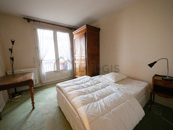 Bedroom with the carpeting floor