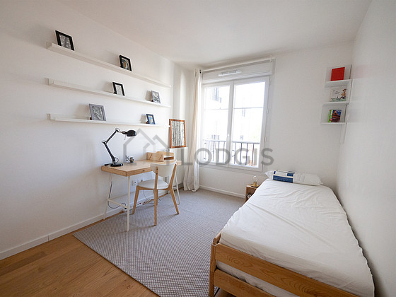 Bedroom with wooden floor