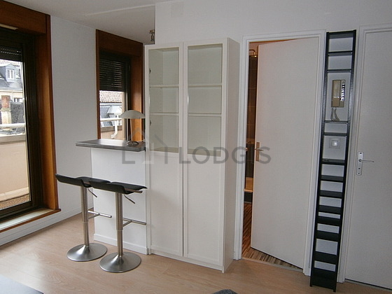 Kitchen equipped with washing machine, refrigerator, freezer, extractor hood