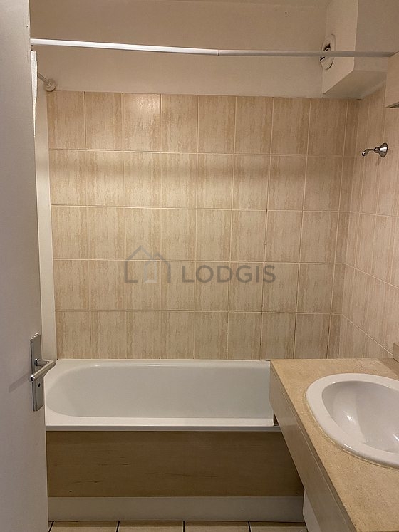 Bathroom equipped with bath tub, shower in bath tub