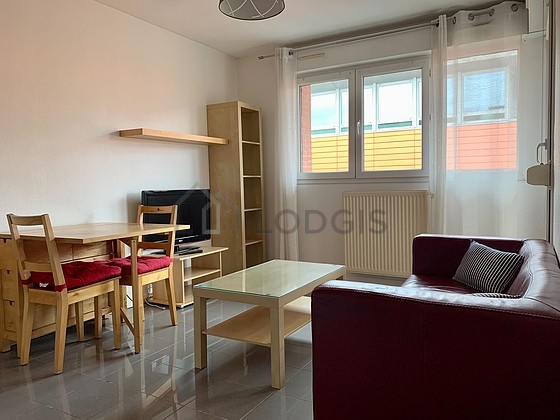 Living room furnished with tv, storage space, 1 chair(s)
