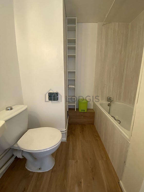 Bathroom equipped with bath tub, shower in bath tub