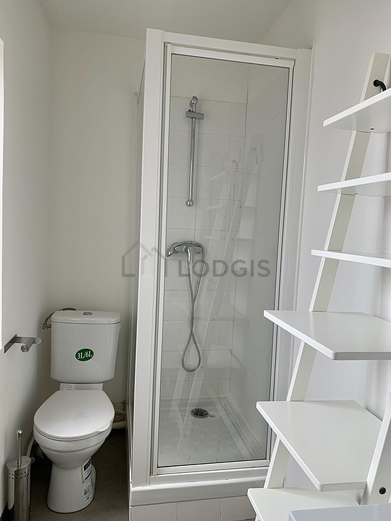 Bathroom equipped with shelves