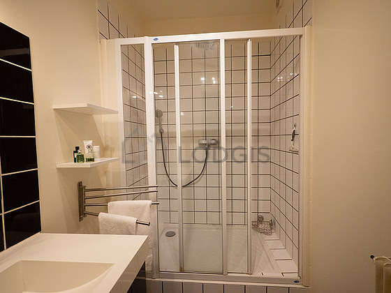 Bathroom equipped with shelves