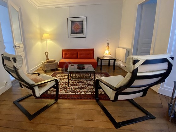 Quiet living room furnished with 1 sofabed(s) of 140cm, tv, 1 armchair(s), 1 chair(s)
