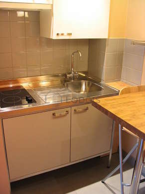Kitchen where you can have dinner for 2 person(s) equipped with hob, refrigerator, freezer, crockery