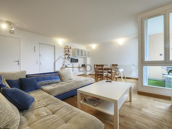 Living room furnished with home cinema, tv, dvd player