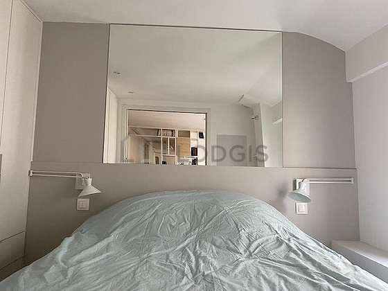 Very bright bedroom equipped with wardrobe, cupboard