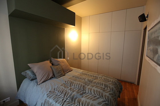 Bedroom with wooden floor