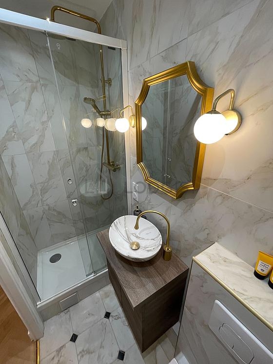 Pleasant and very bright bathroom with marble floor