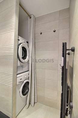Bathroom equipped with washing machine, dryer