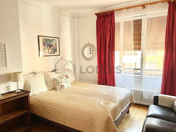 Bedroom with wooden floor