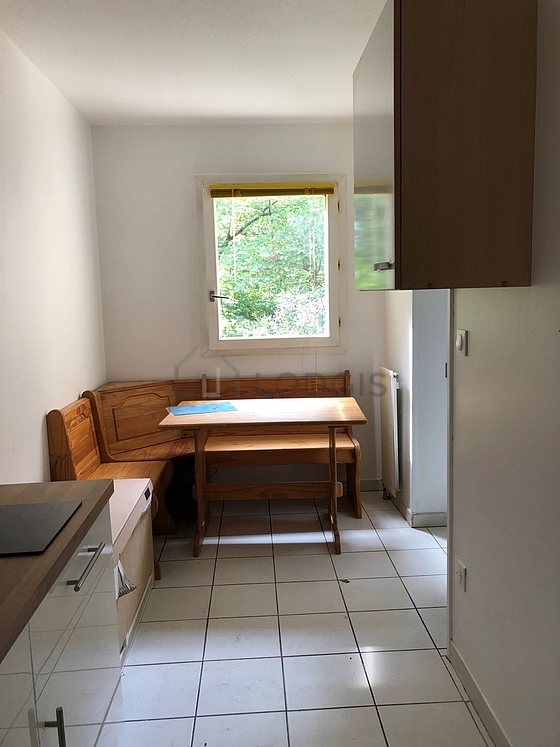 Kitchen equipped with washing machine, refrigerator