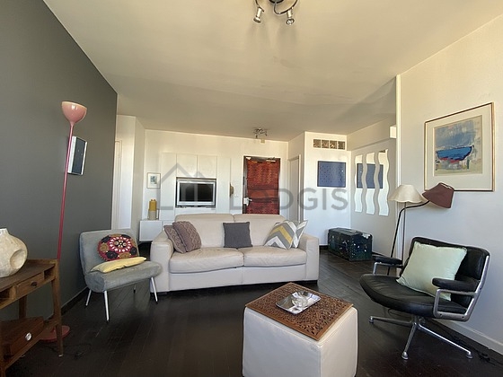 Living room furnished with 1 sofabed(s) of 140cm, tv, 1 armchair(s), 1 chair(s)