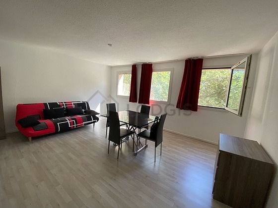 Very quiet living room furnished with 1 sofabed(s) of 130cm, sofa, coffee table, 1 chair(s)