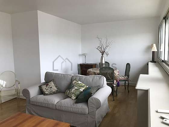 Living room furnished with tv, storage space, 1 chair(s)