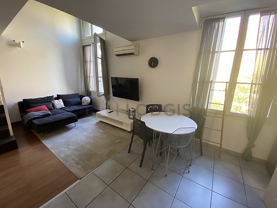 Living room furnished with air conditioning, sofa, 1 armchair(s), 1 chair(s)